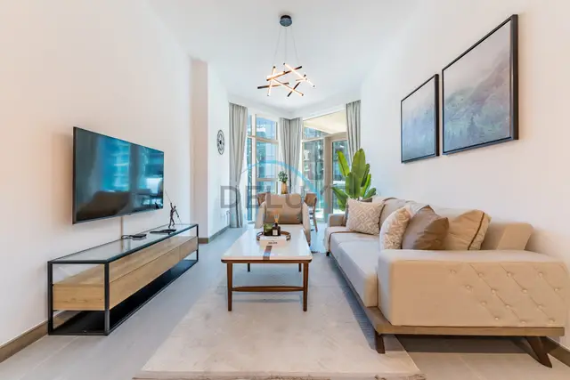 Contemporary 1-Bedroom w/ Partial Canal Views — Business Bay